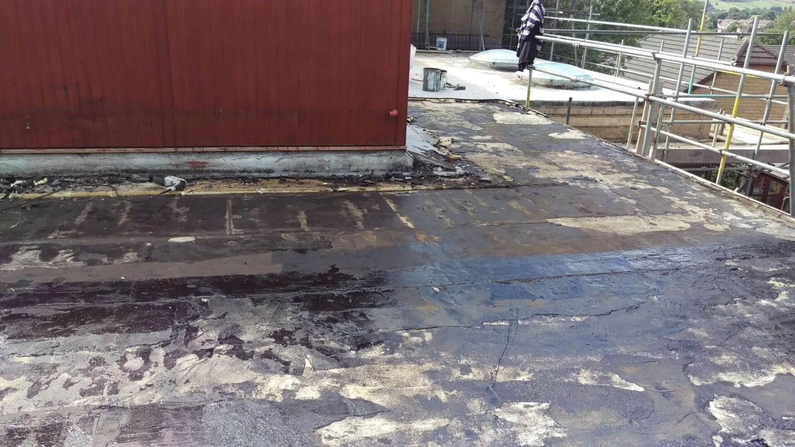 Storm damaged flat roof on a commercial building
